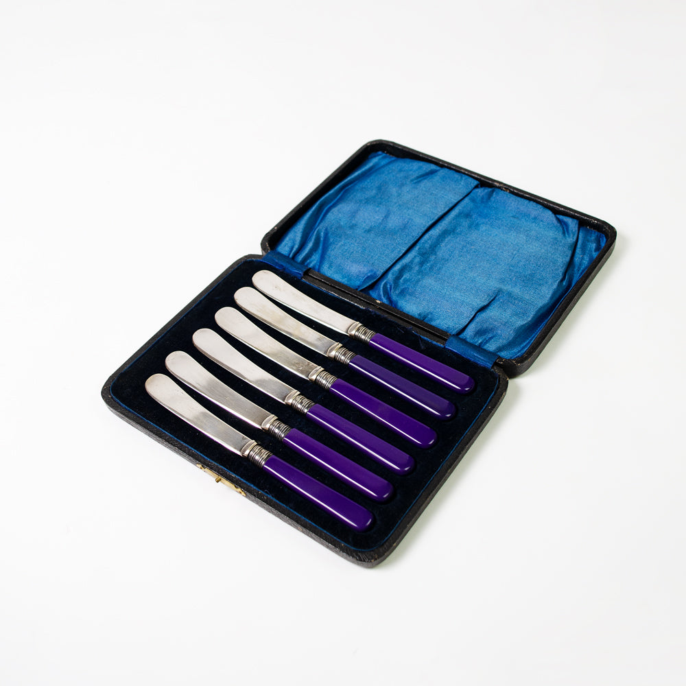 Set of Silver and Purple Butter Knives