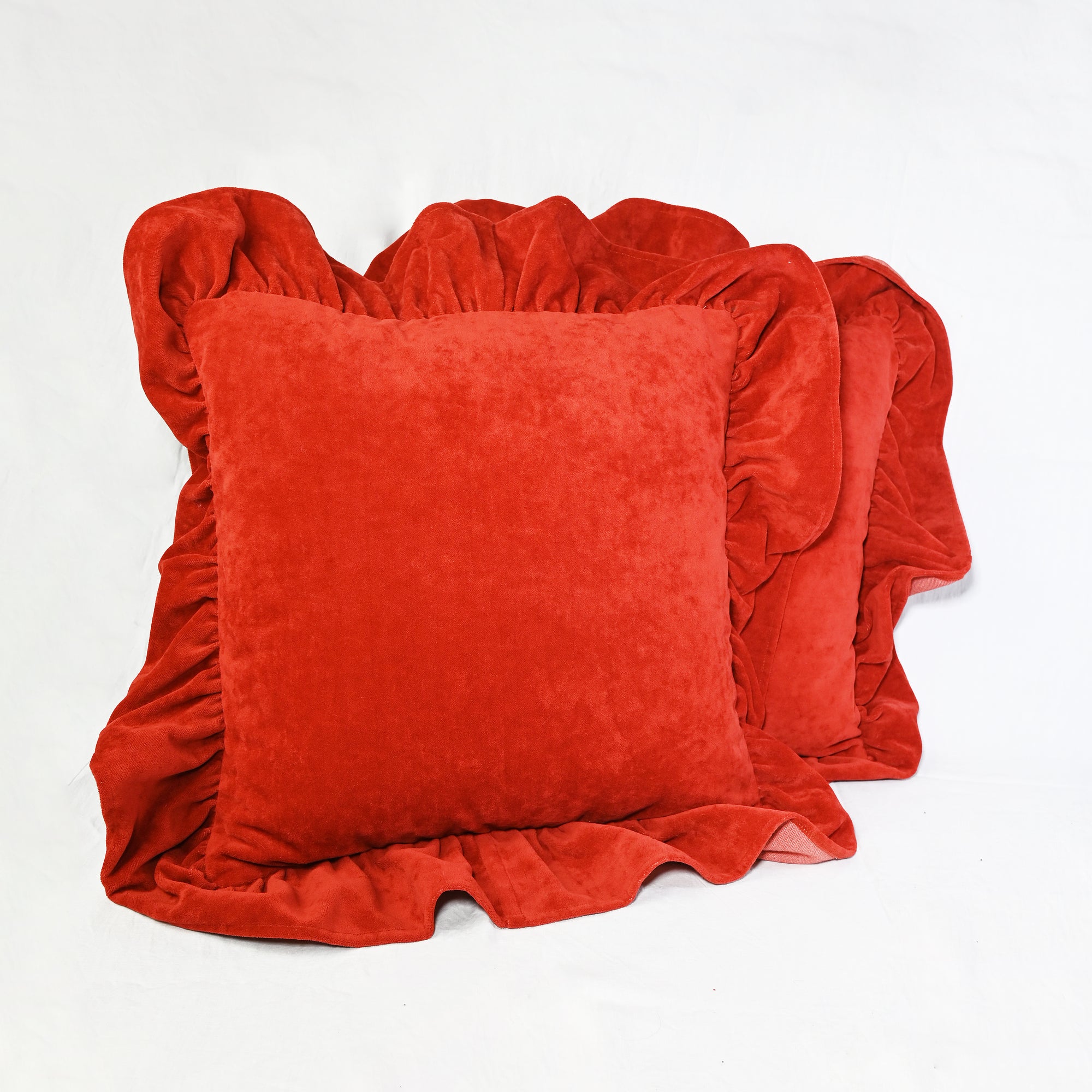 Luxurious velvet ruffle edged cushion