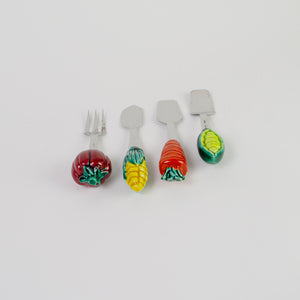 Set of quirky vegetable serving utensils