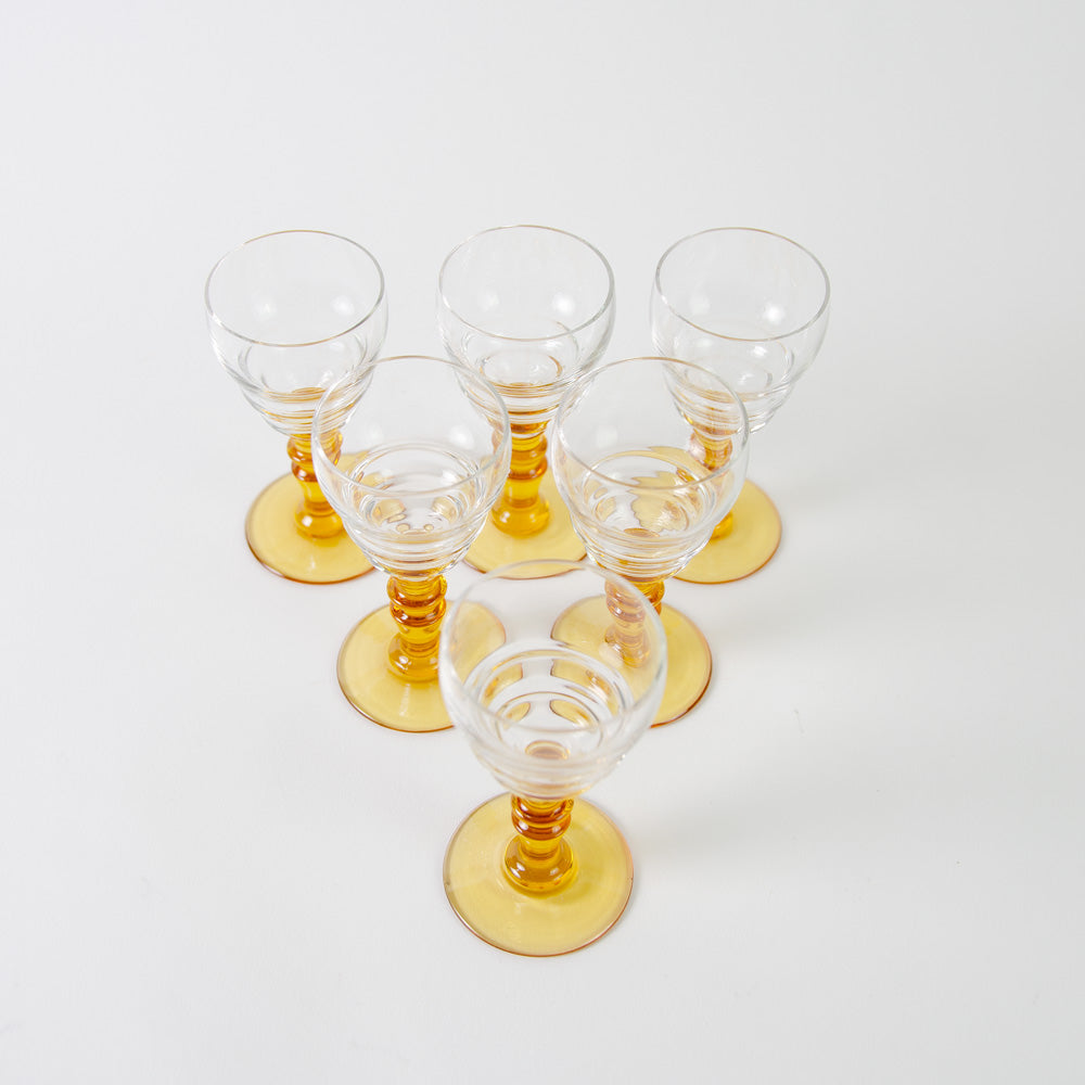 Set of French, amber stemmed Art Deco glasses