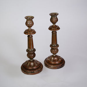 A Stunning Pair of Brass and Silver Candle Sticks