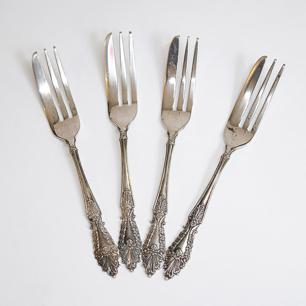 Set of four silver dessert forks